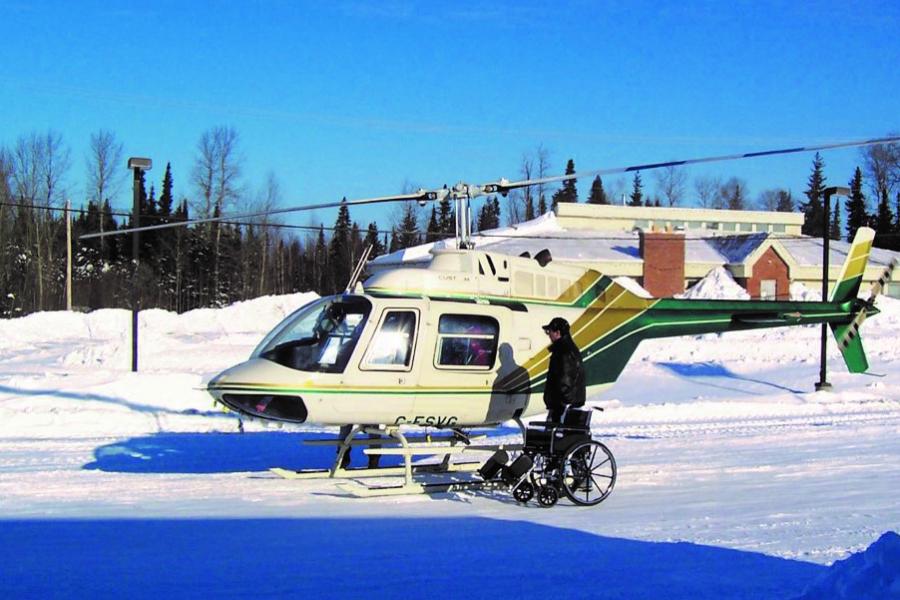 A small plane on a snowy field.